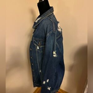 Distressed medium dark blue jean waist length jacket
